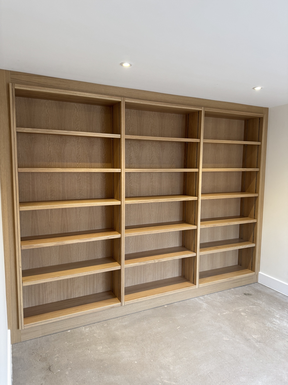 Finished oak shelving made by TFS