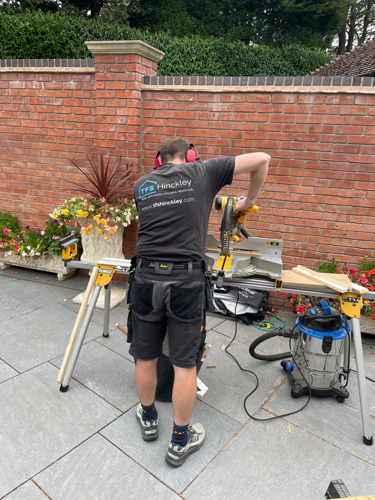 TFS fitter cutting material on site