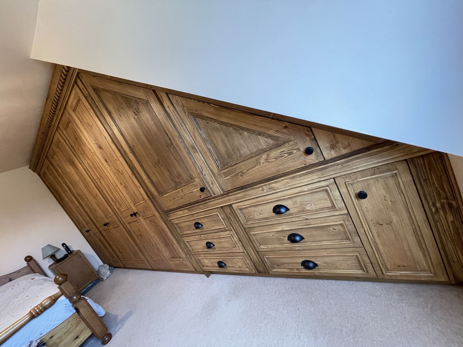 Angled Stained Pine Bedroom — Stoney Stanton